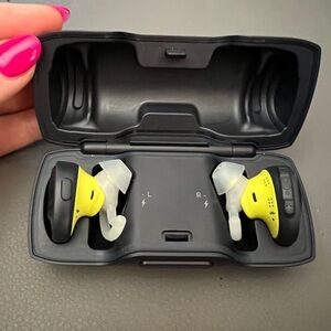 Bose Sound Sport Free Wireless earbuds, used briefly but great condition.